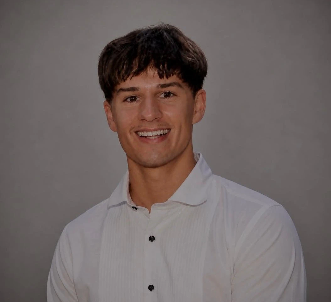 Rocco smiling in a portrait